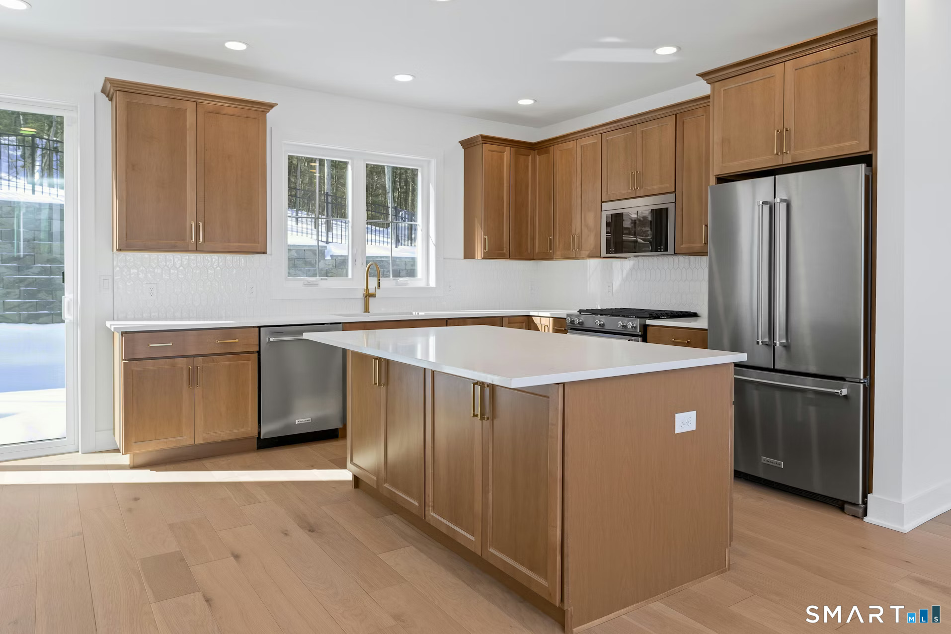 27 Bramble Way Brookfield, CT 06804 - Photo 3 of 26 a kitchen with stainless steel appliances a refrigerator sink and microwave