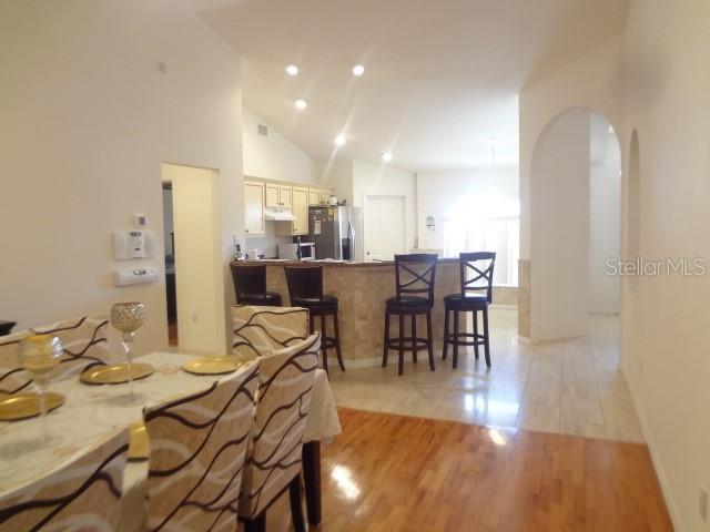 124 Foster Lane Palm Coast, FL 32137 - Photo 9 of 23 a view of a dining room with furniture