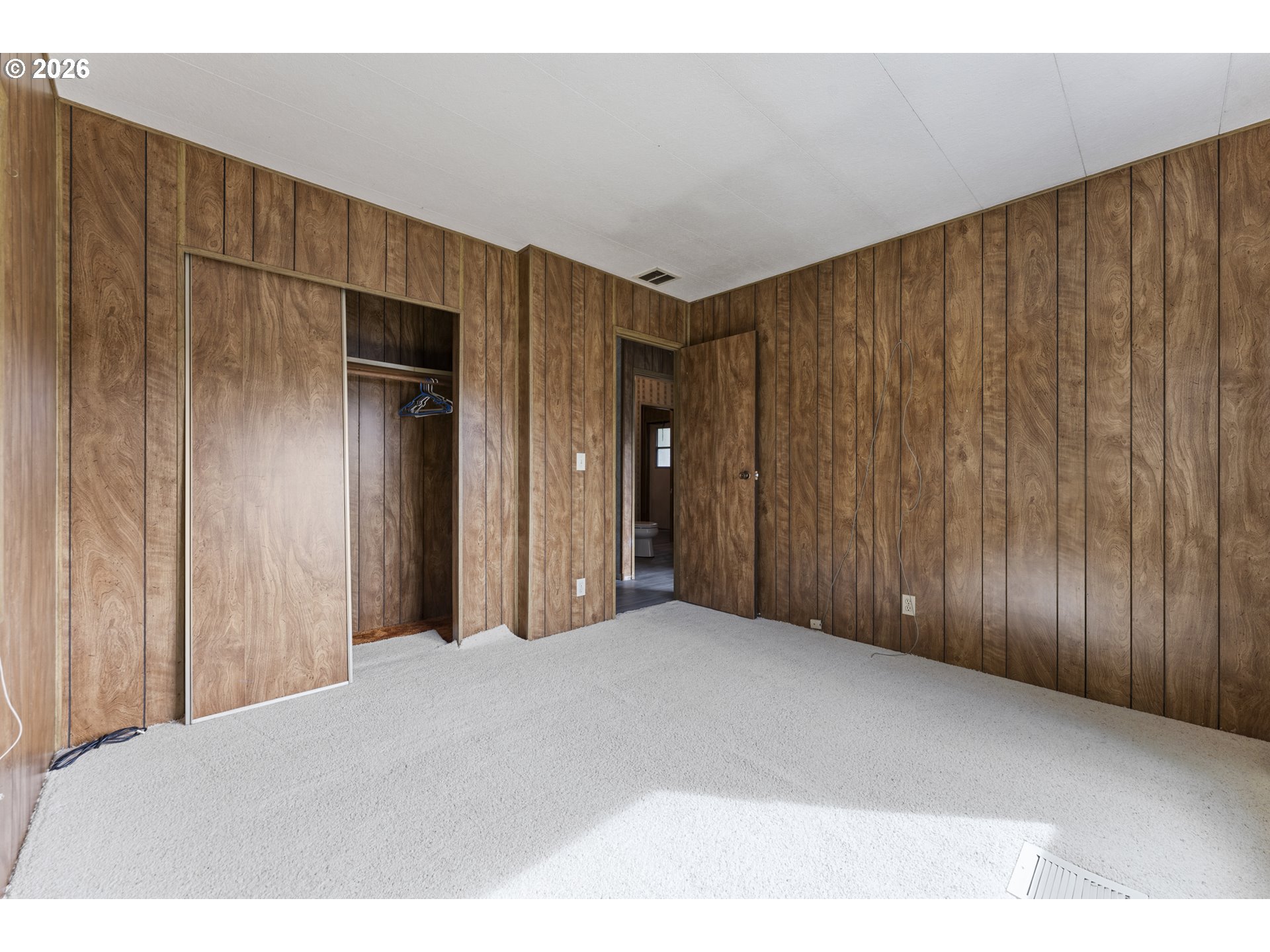 1600 Rhododendron Drive, Unit 415 Florence, OR 97439 - Photo 15 of 29 a view of entryway with wooden walls