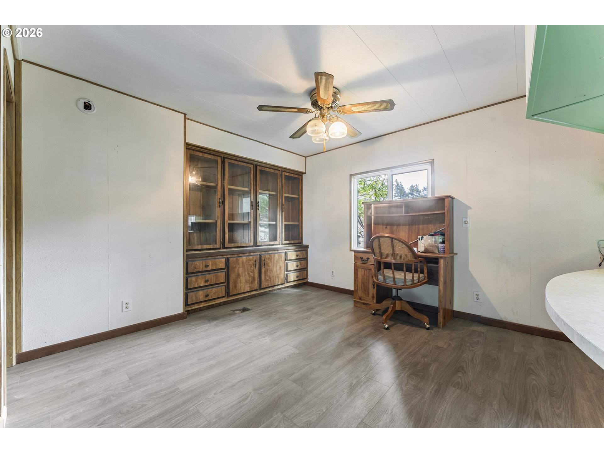 1600 Rhododendron Drive, Unit 415 Florence, OR 97439 - Photo 2 of 29 a view of a livingroom with furniture and a window
