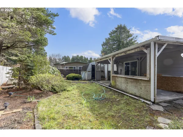 a view of backyard of house