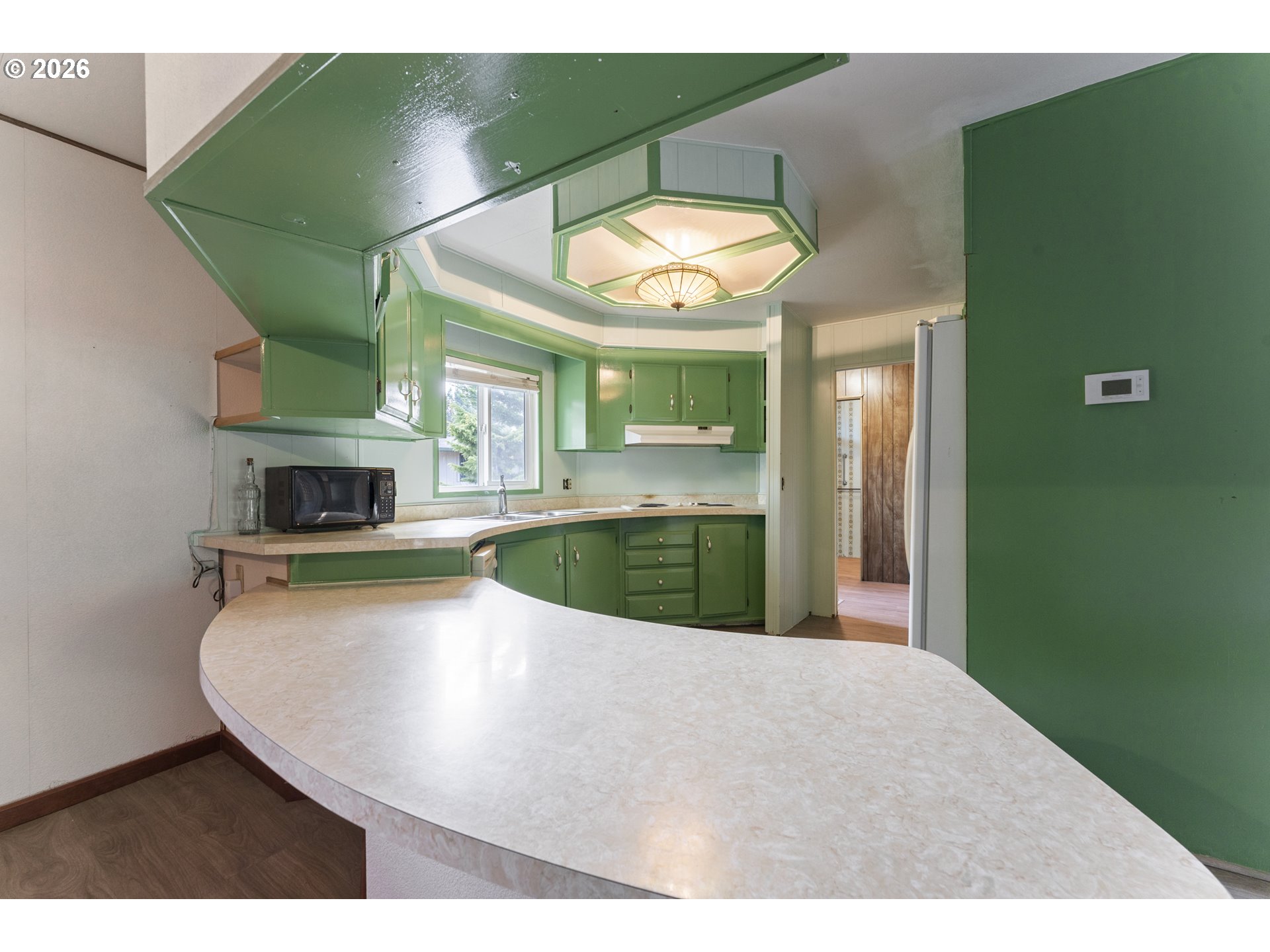 1600 Rhododendron Drive, Unit 415 Florence, OR 97439 - Photo 3 of 29 a view of a living room and bathroom