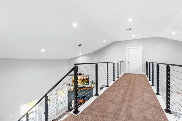 a bedroom with a bed couch and a window