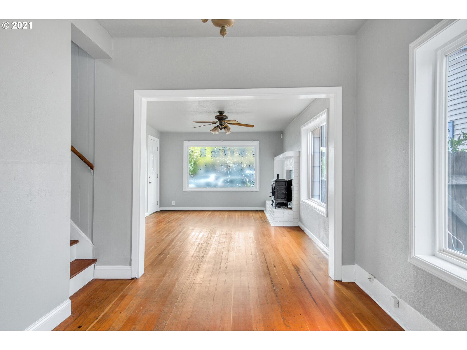 1215 2nd Street Northwest Salem, OR 97304 - Photo 12 of 32 a view interior of a house with wooden floor and windows