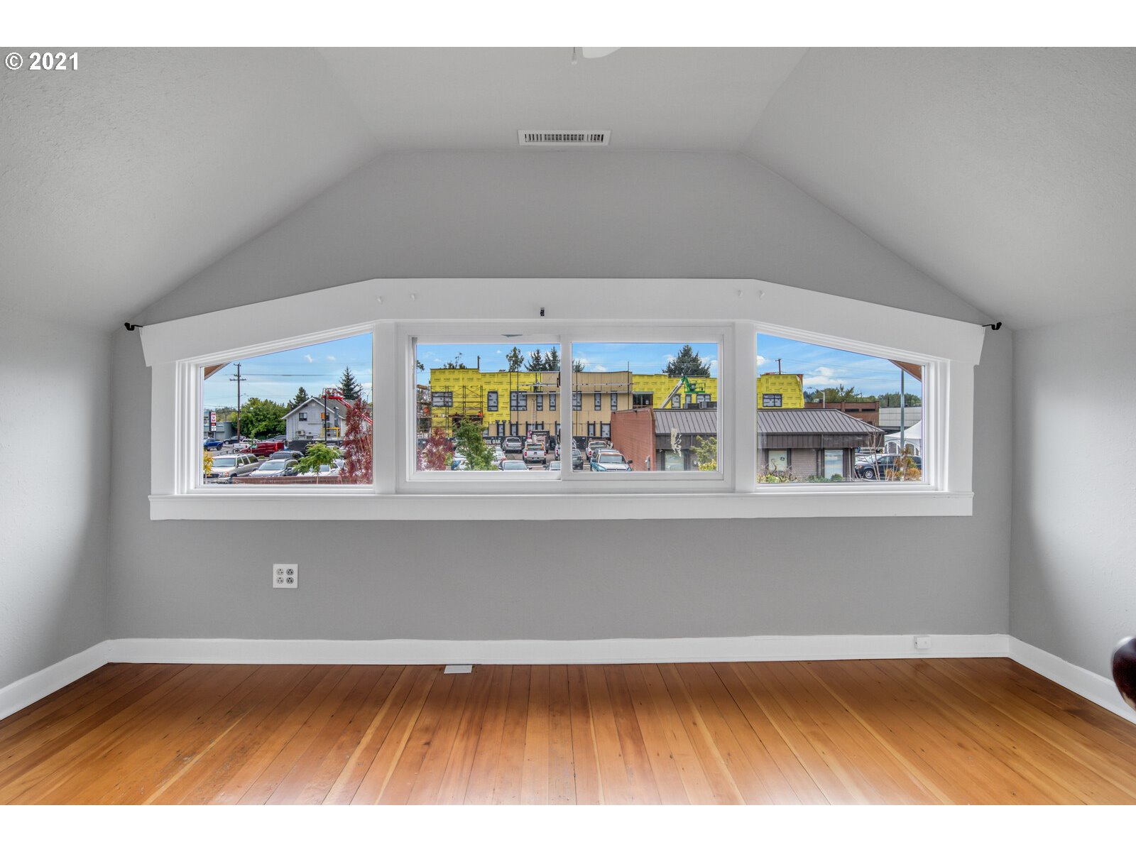 1215 2nd Street Northwest Salem, OR 97304 - Photo 20 of 32 a view of room with window and wooden floor