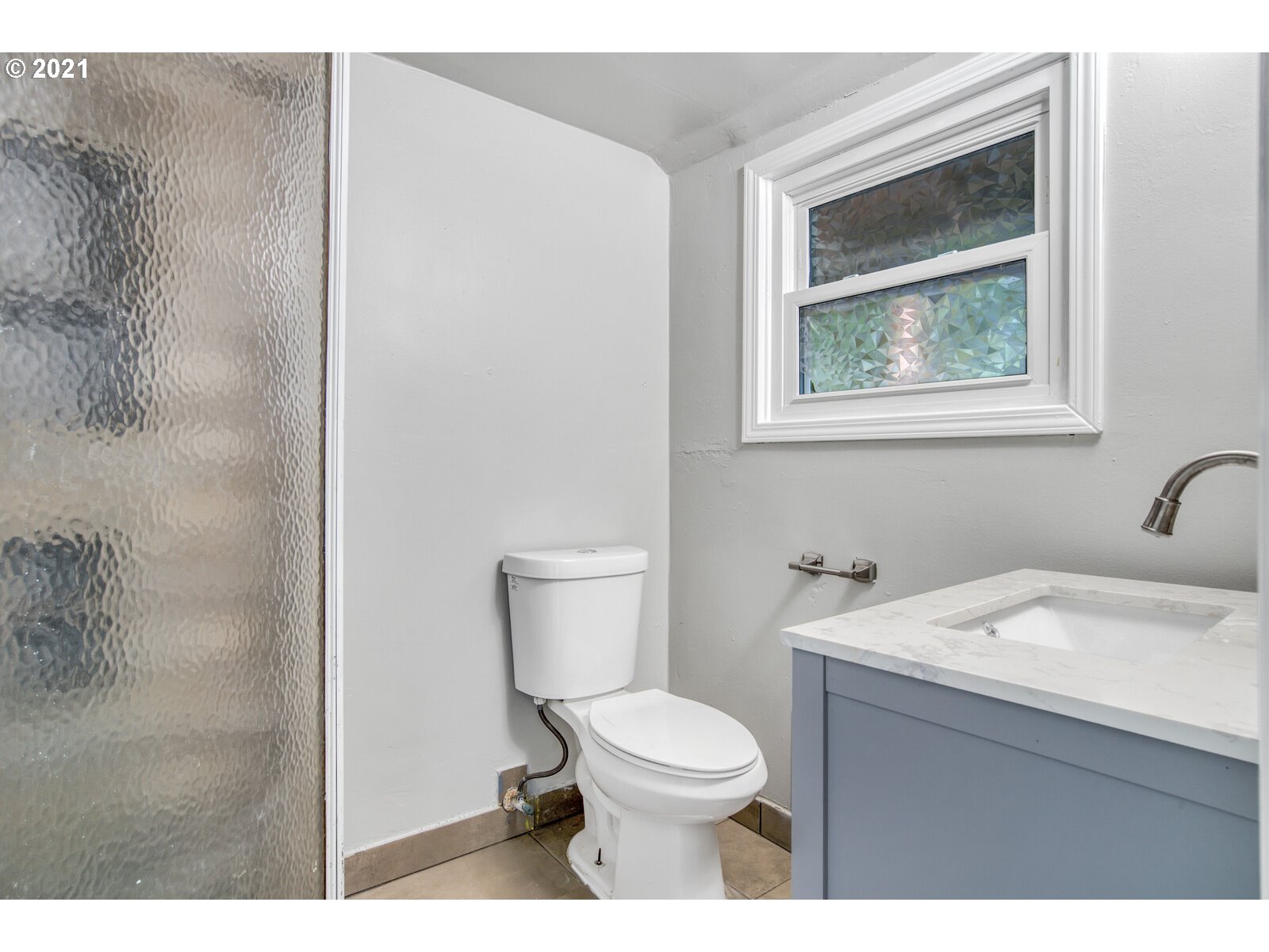 1215 2nd Street Northwest Salem, OR 97304 - Photo 23 of 32 a bathroom with a sink and a toilet