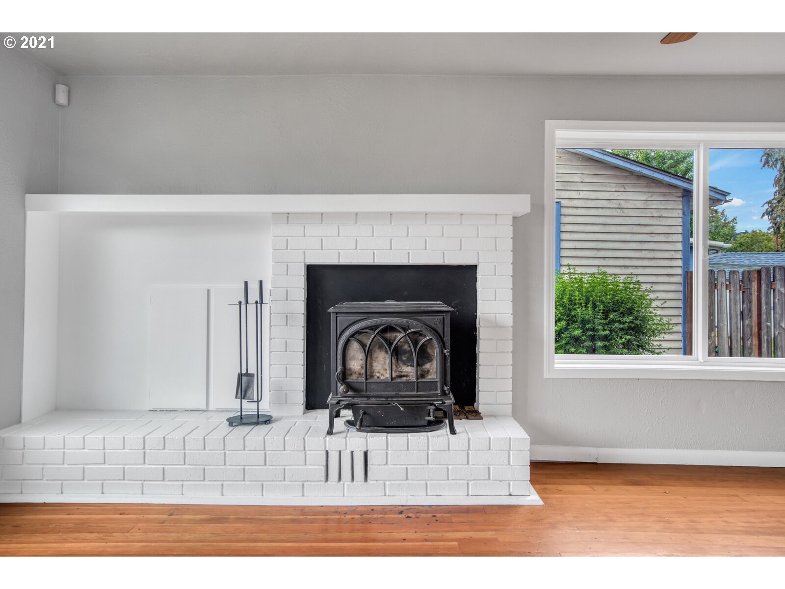 1215 2nd Street Northwest Salem, OR 97304 - Photo 7 of 32 a view of fireplace and wooden floor