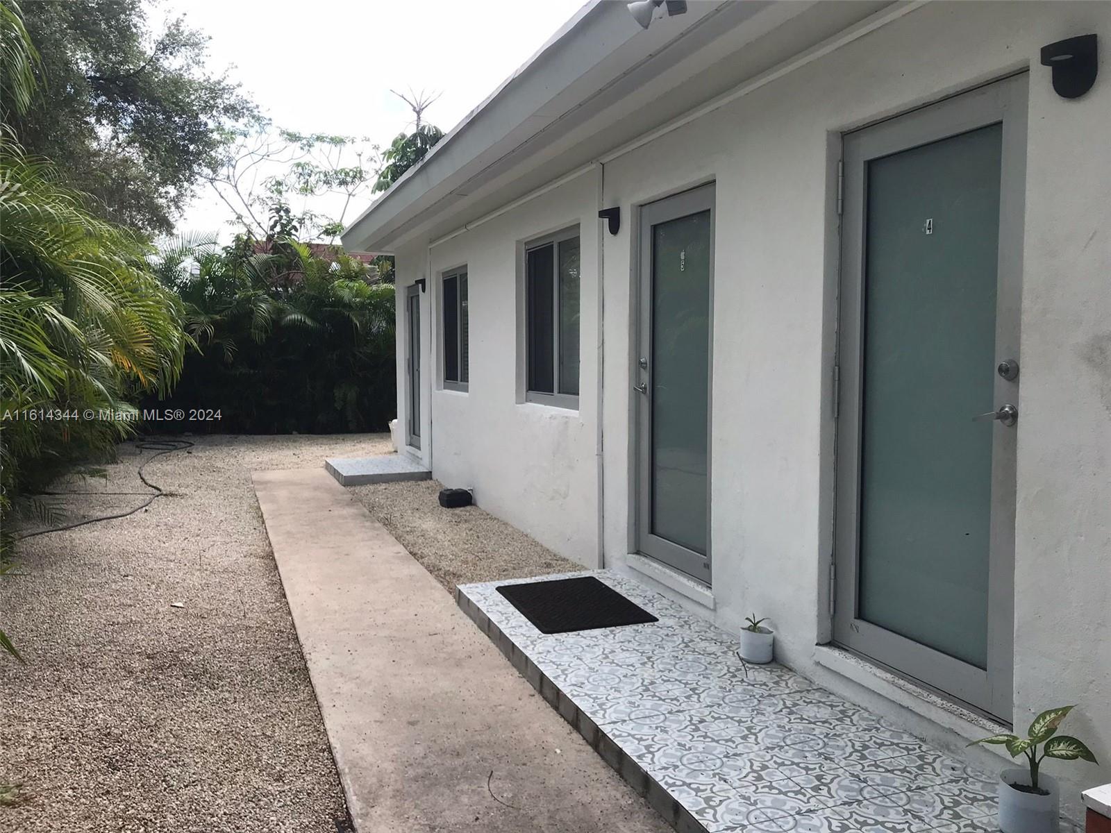 Santa Clara Miami, FL 33127 - Photo 2 of 11 a house view with a outdoor space