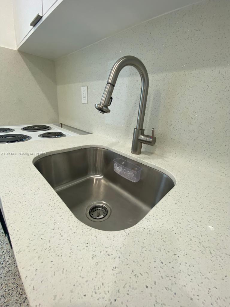 Santa Clara Miami, FL 33127 - Photo 7 of 11 a close view of sink and tap