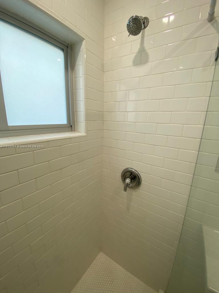 Santa Clara Miami, FL 33127 - Photo 10 of 11 a bathroom with a shower