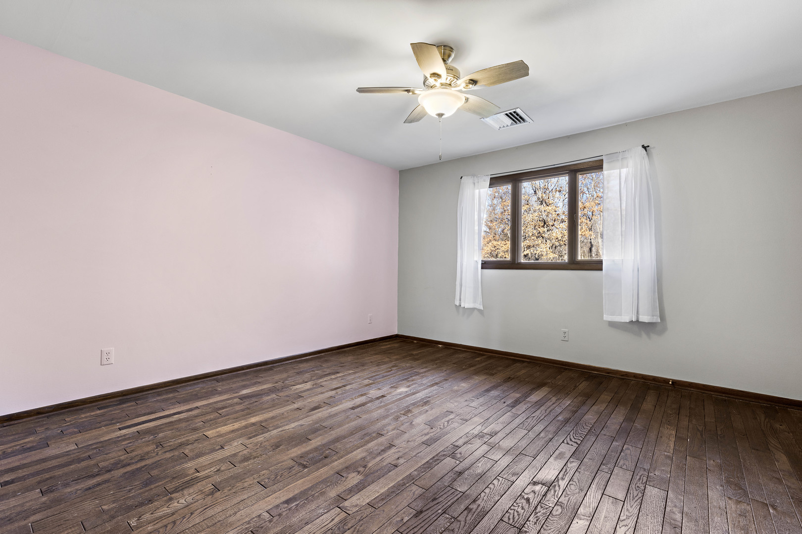 15291 Beaverton Road Poplar Grove, IL 61065 - Photo 25 of 37 a view of an empty room with a window and wooden floor