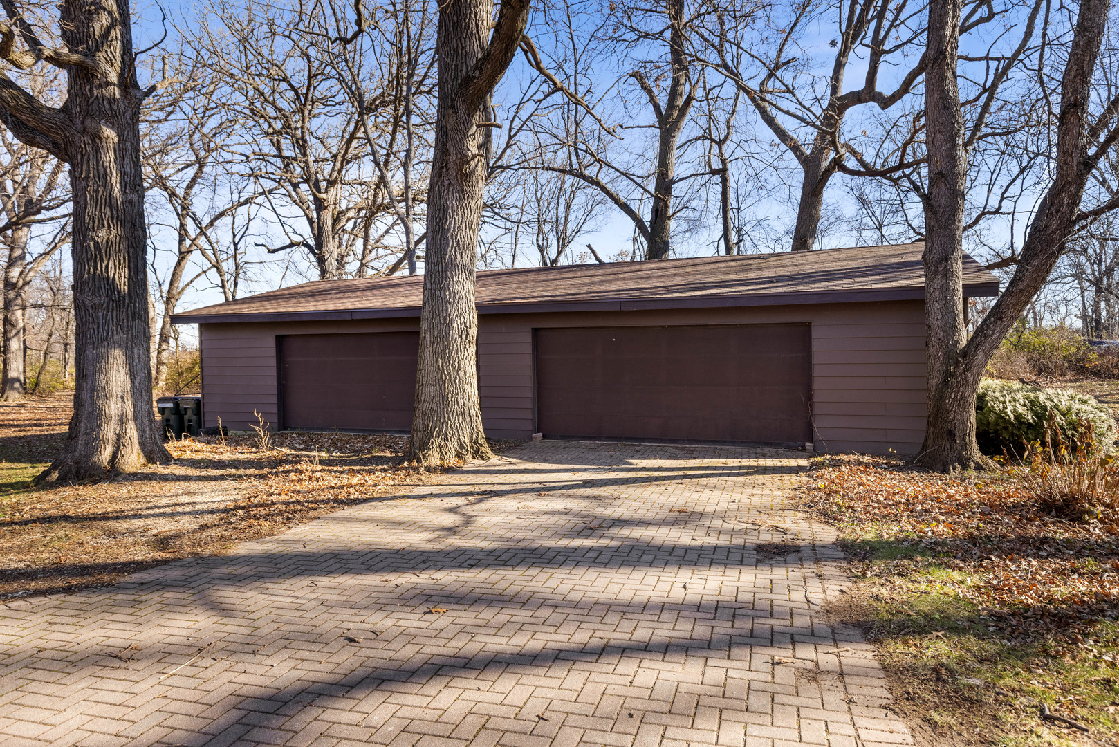15291 Beaverton Road Poplar Grove, IL 61065 - Photo 3 of 37 a house with trees in front of it