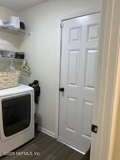 a utility room with dryer and washer