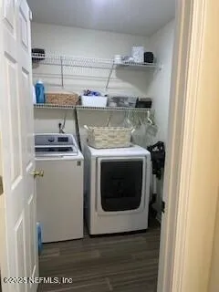 a utility room with dryer and washer