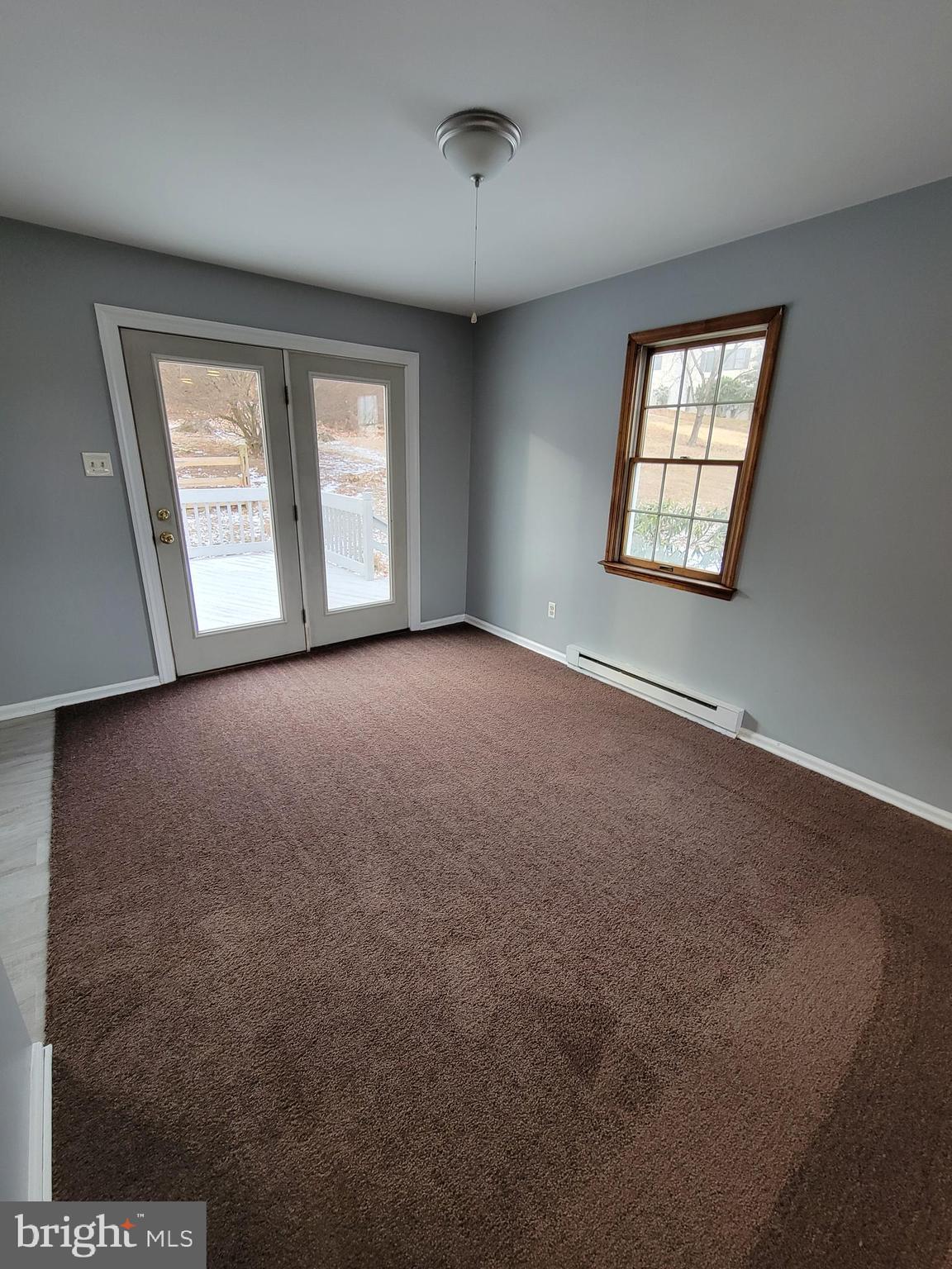 320 Troutman Road Collegeville, PA 19426 - Photo 4 of 21 an empty room with windows
