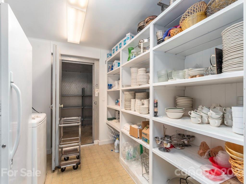 566 Walker Road Waynesville, NC 28786 - Photo 15 of 28 a room with a walk in closet and a window