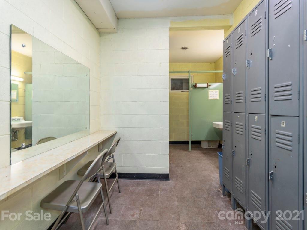 566 Walker Road Waynesville, NC 28786 - Photo 20 of 28 a view of a bathroom with a shower and a sink