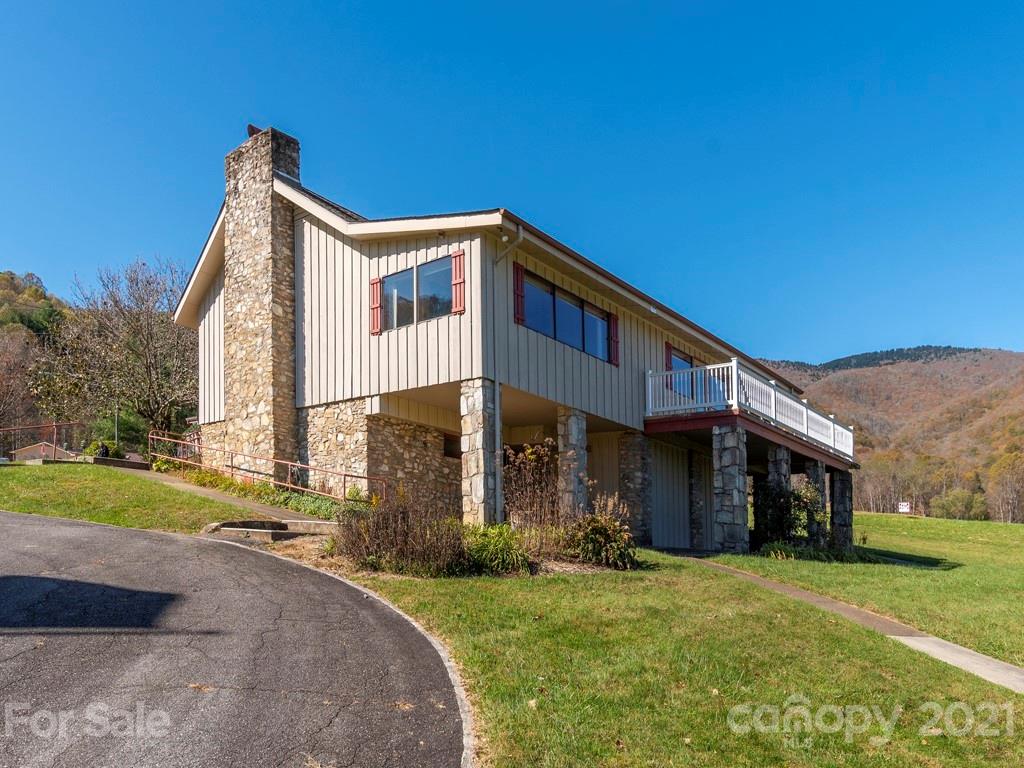 566 Walker Road Waynesville, NC 28786 - Photo 21 of 28 a front view of a house with a yard
