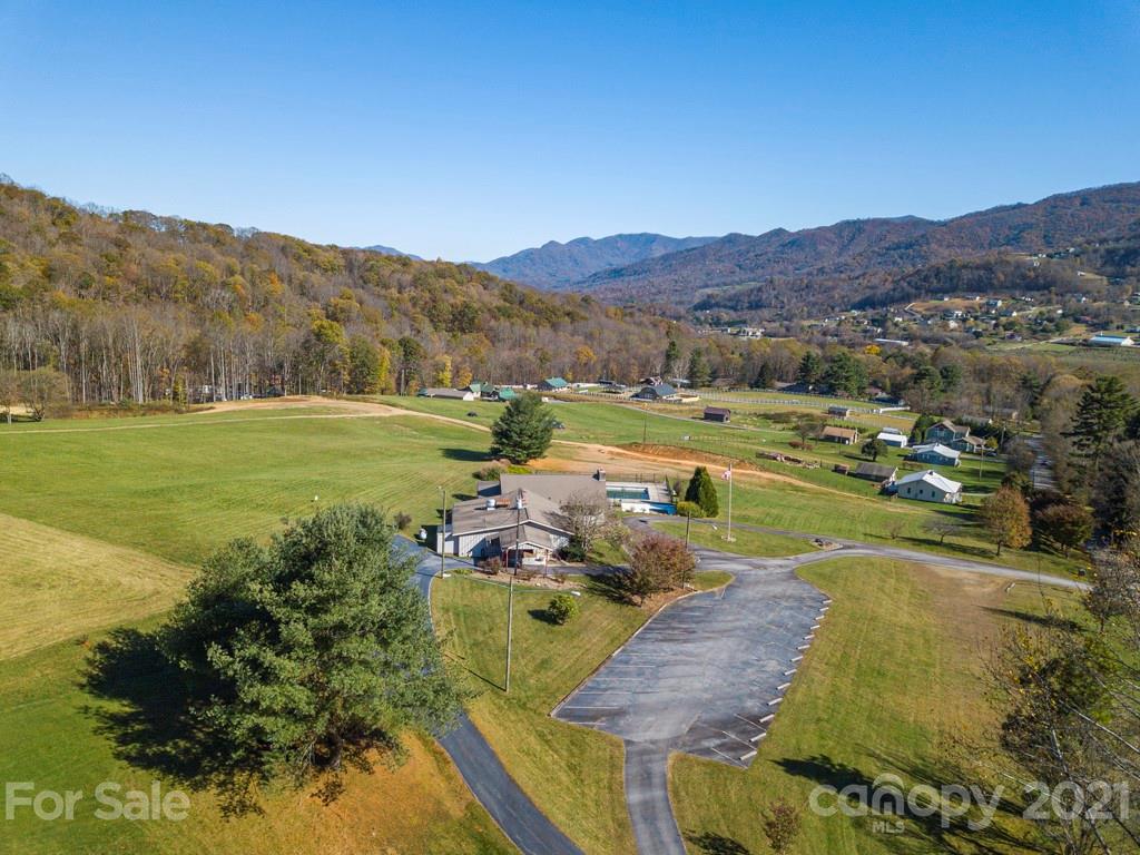 566 Walker Road Waynesville, NC 28786 - Photo 27 of 28 a view of an outdoor space yard and mountain