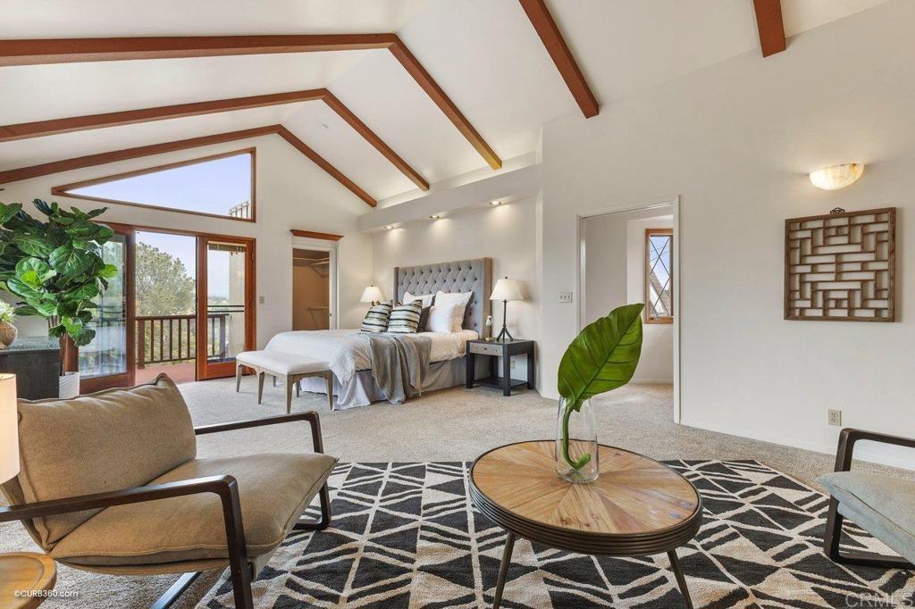 602 Sereno View Road Encinitas, CA 92024 - Photo 18 of 56 a living room with furniture and a table