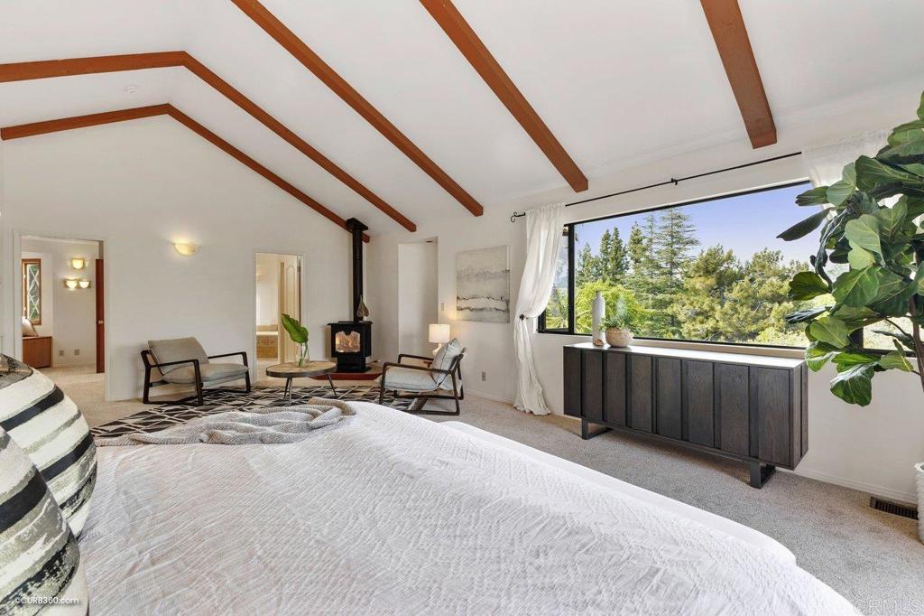 602 Sereno View Road Encinitas, CA 92024 - Photo 19 of 56 a living room with furniture and a large window