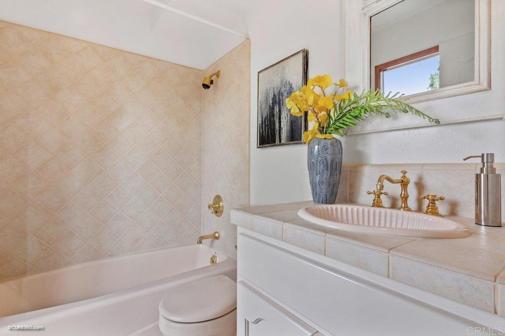 602 Sereno View Road Encinitas, CA 92024 - Photo 38 of 56 a bath room with a bathtub and a shower