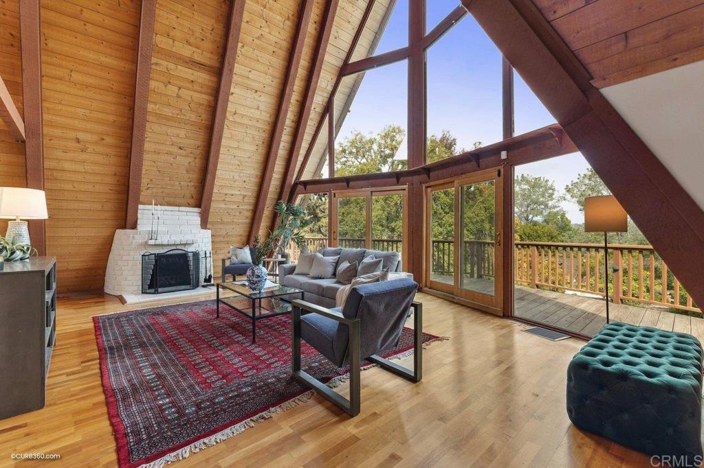 602 Sereno View Road Encinitas, CA 92024 - Photo 4 of 56 a living room with furniture and a large window