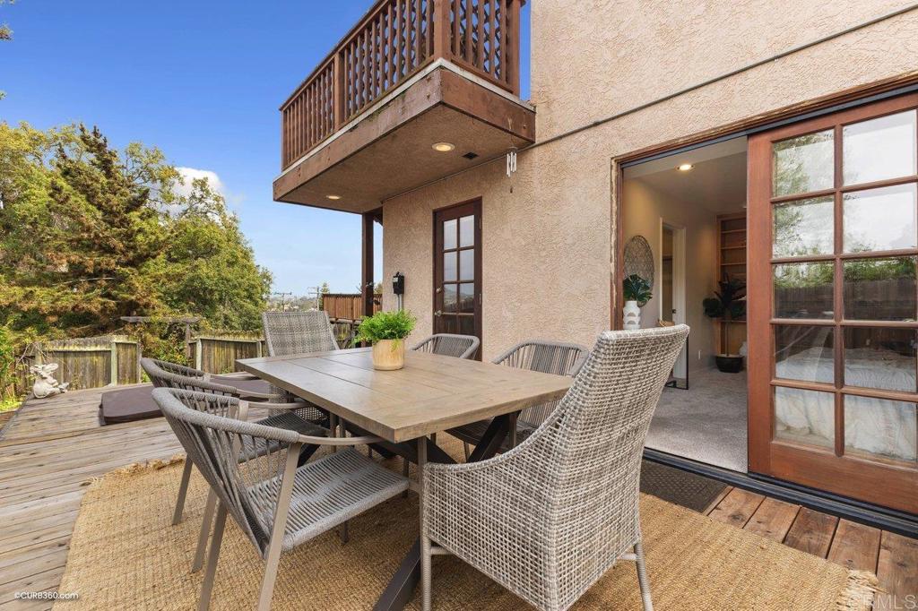 602 Sereno View Road Encinitas, CA 92024 - Photo 42 of 56 a view of a patio with a table and chairs