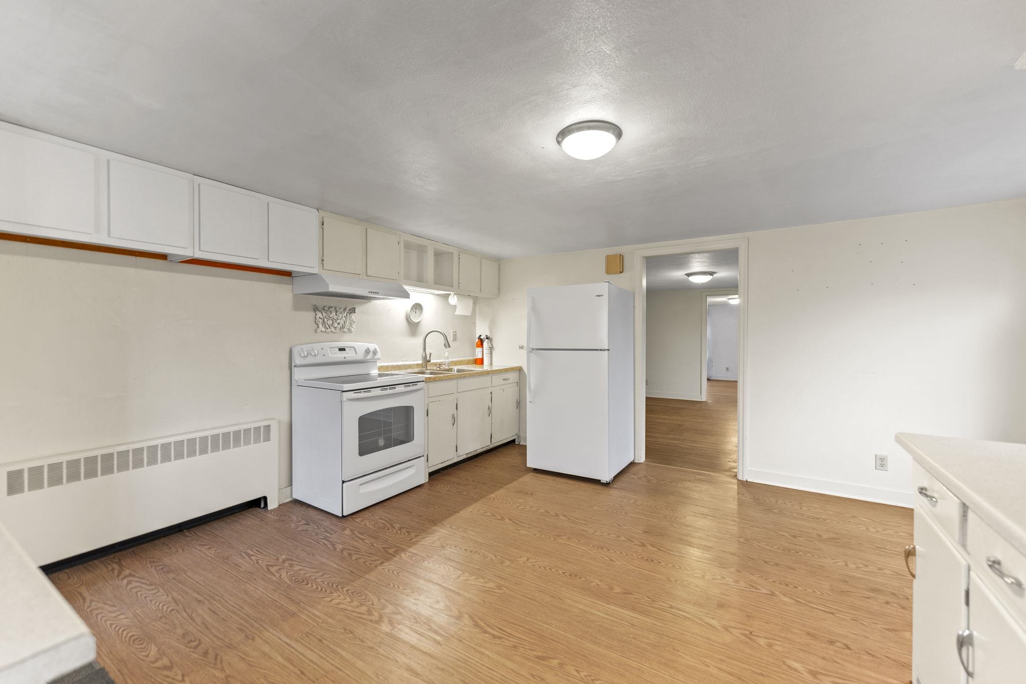 739 Elgin Street Cherry Valley, IL 61016 - Photo 29 of 41 a kitchen with stainless steel appliances a refrigerator sink and cabinets