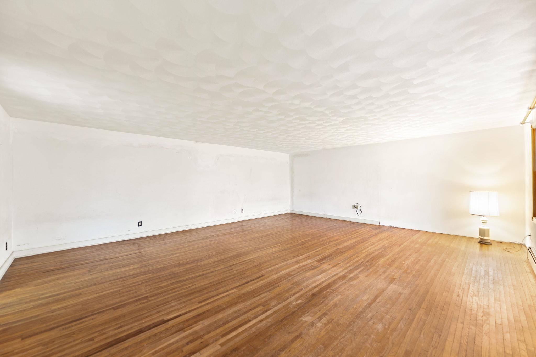 739 Elgin Street Cherry Valley, IL 61016 - Photo 5 of 41 a view of empty room with wooden floor
