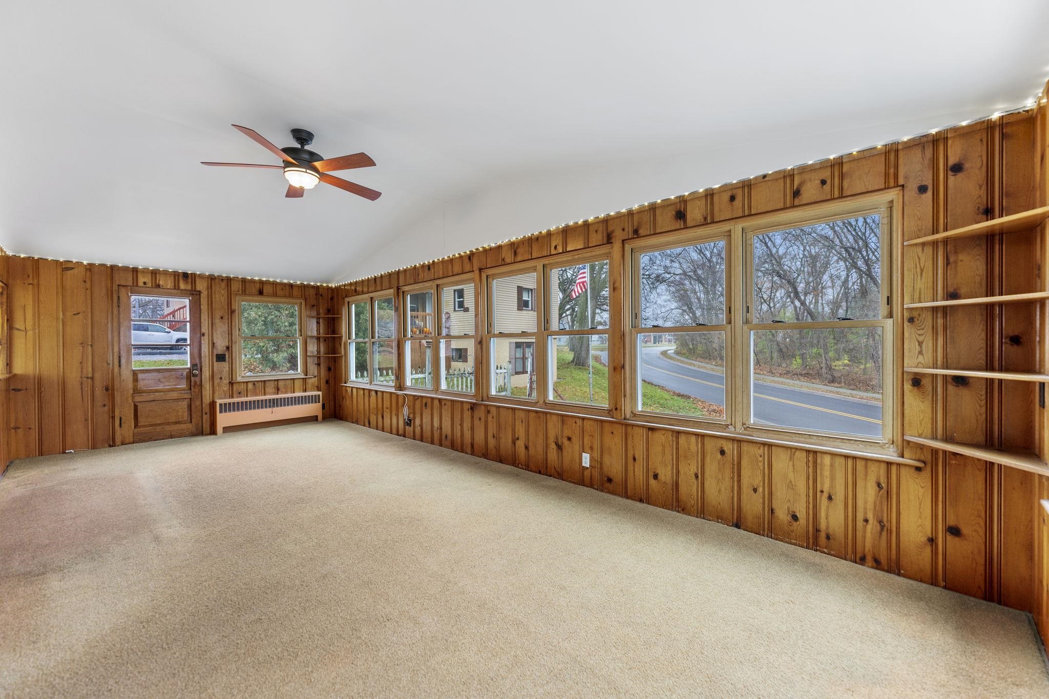 739 Elgin Street Cherry Valley, IL 61016 - Photo 9 of 41 an empty room with windows
