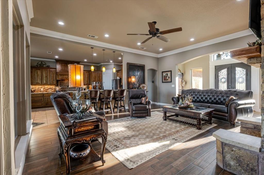 10106 Prather Road Springtown, TX 76082 - Photo 9 of 40 a living room with furniture and wooden floor