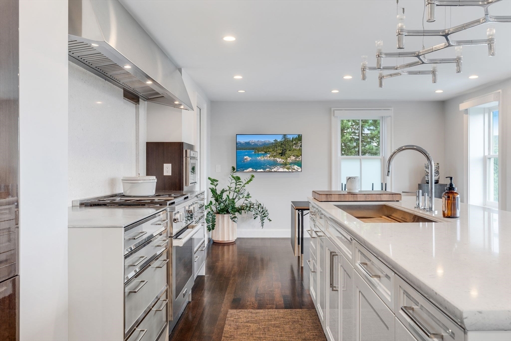 5 Redstone Lane Marblehead, MA 01945 - Photo 12 of 37 a kitchen with stainless steel appliances granite countertop a sink stove and refrigerator