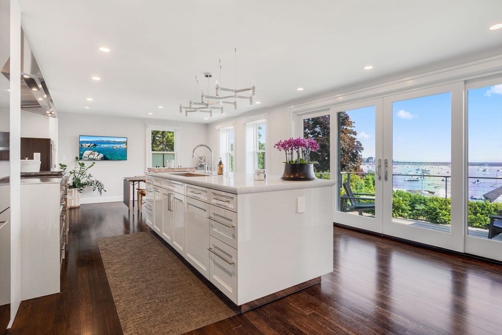 5 Redstone Lane Marblehead, MA 01945 - Photo 13 of 37 a kitchen with white cabinets and window