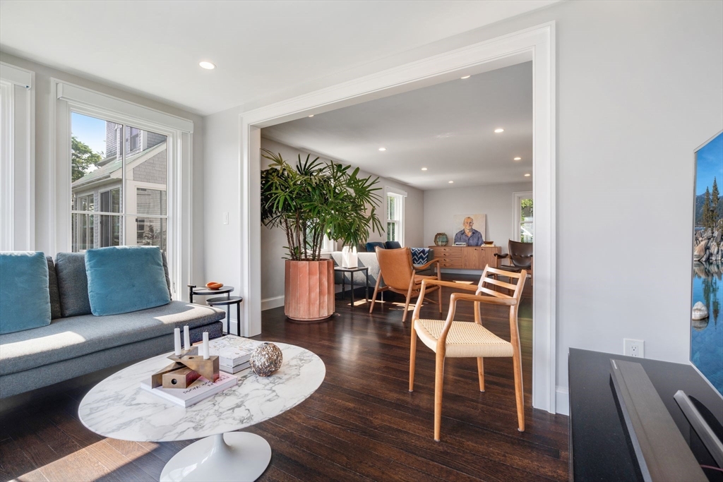 5 Redstone Lane Marblehead, MA 01945 - Photo 16 of 37 a living room with furniture and a dining table with wooden floor
