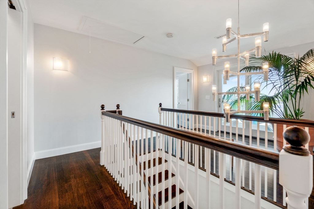 5 Redstone Lane Marblehead, MA 01945 - Photo 18 of 37 a view of a hallway with entryway and wooden floor