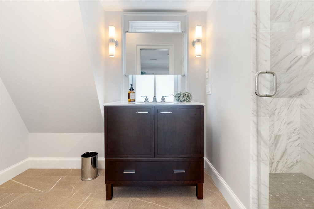 5 Redstone Lane Marblehead, MA 01945 - Photo 19 of 37 a bathroom with a sink and a mirror