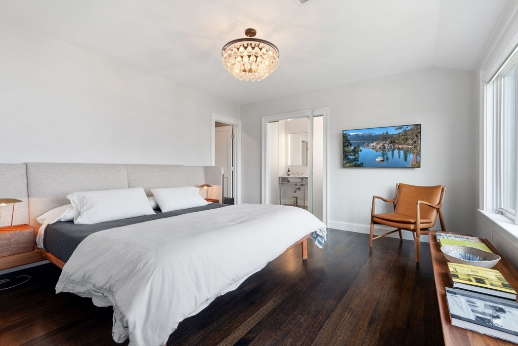 5 Redstone Lane Marblehead, MA 01945 - Photo 23 of 37 a bedroom with a bed and a chair