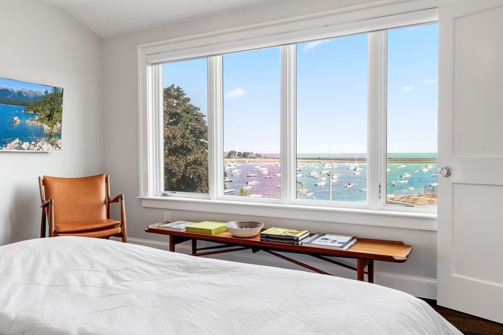 5 Redstone Lane Marblehead, MA 01945 - Photo 24 of 37 a bedroom with a bed and large window