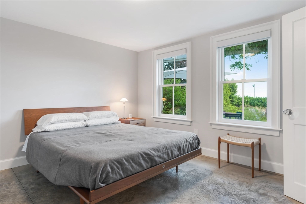 5 Redstone Lane Marblehead, MA 01945 - Photo 28 of 37 a bedroom with a bed and a window
