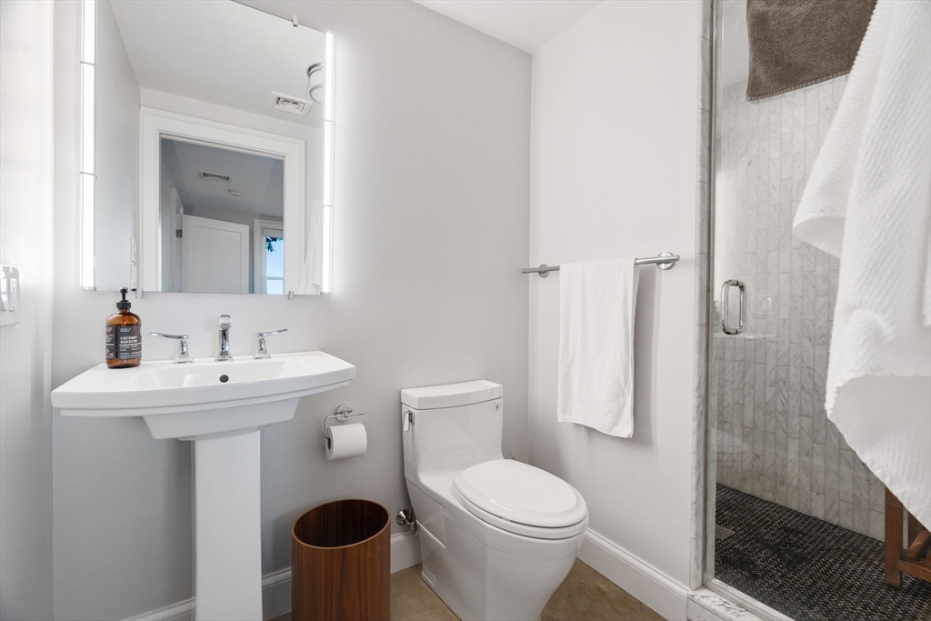 5 Redstone Lane Marblehead, MA 01945 - Photo 29 of 37 a bathroom with a sink toilet and a mirror