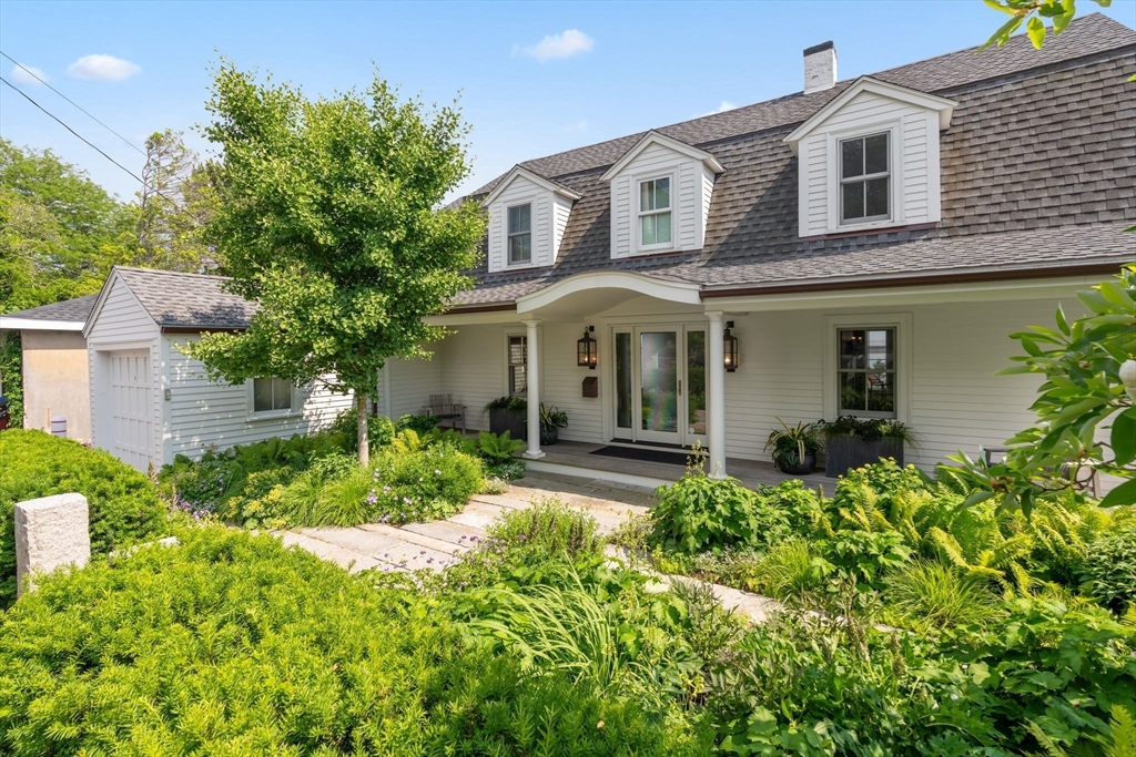 5 Redstone Lane Marblehead, MA 01945 - Photo 3 of 37 a front view of a house with a yard