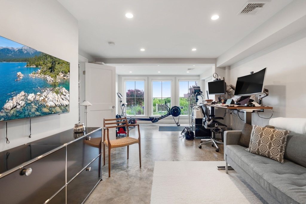 5 Redstone Lane Marblehead, MA 01945 - Photo 32 of 37 a living room with furniture and a flat screen tv