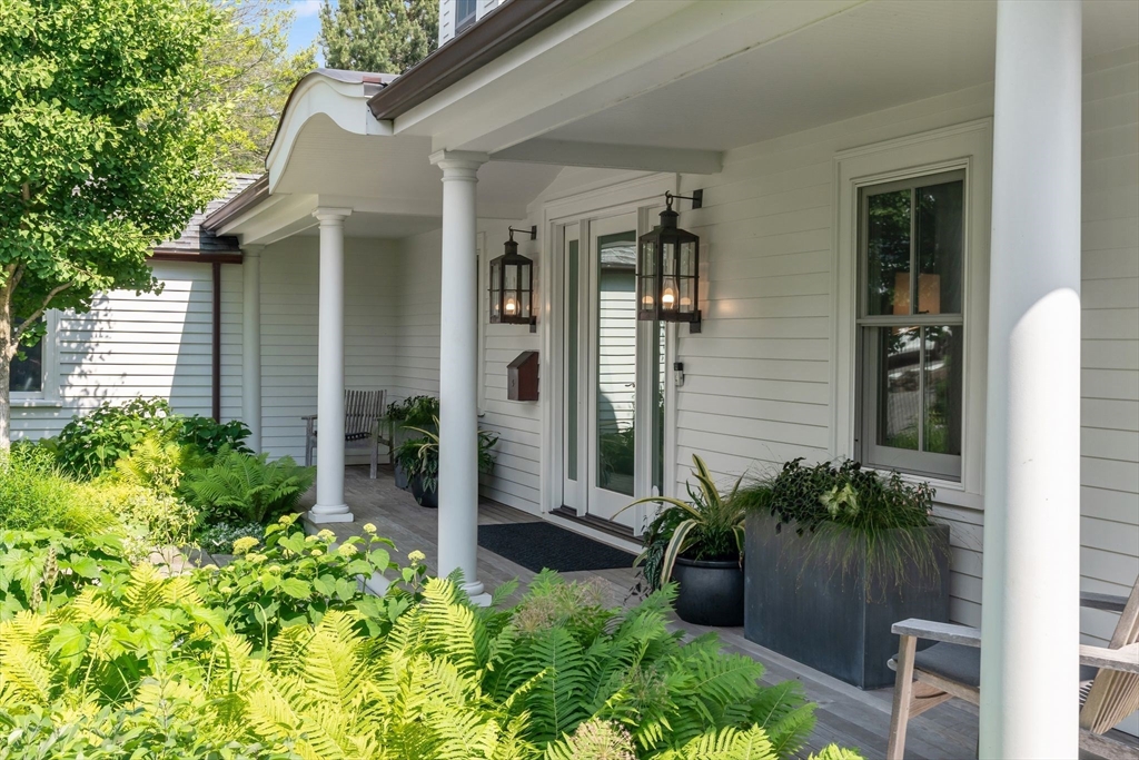 5 Redstone Lane Marblehead, MA 01945 - Photo 4 of 37 front view of a house with potted plants