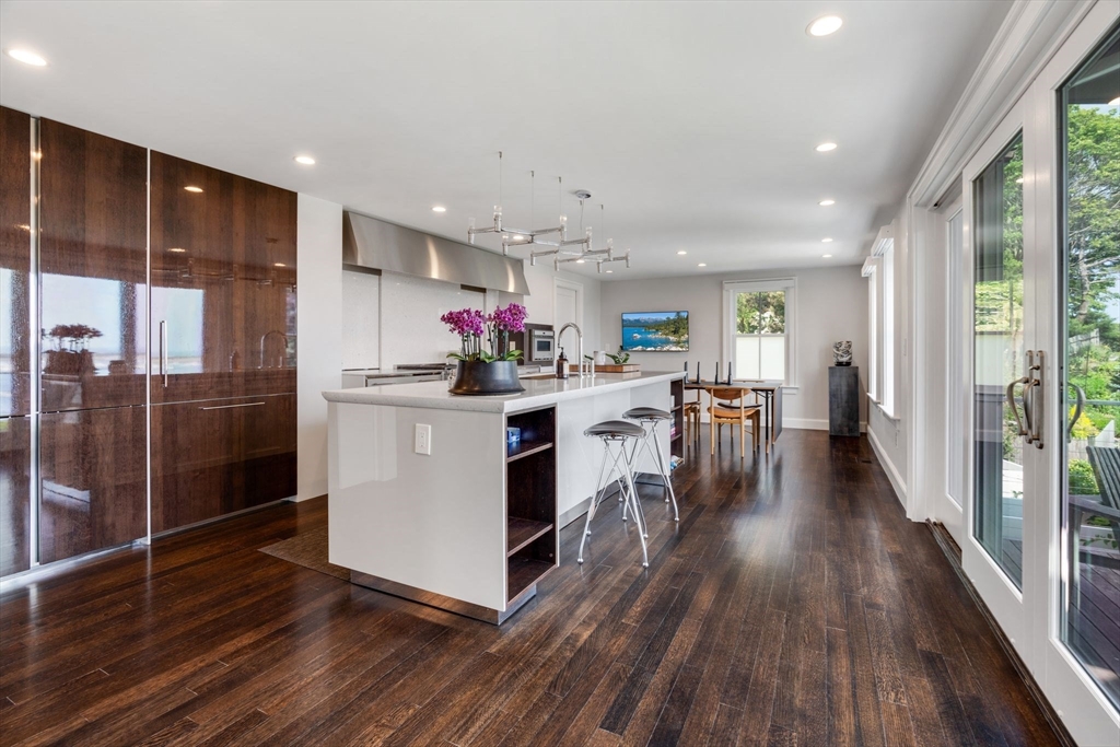 5 Redstone Lane Marblehead, MA 01945 - Photo 9 of 37 a kitchen that has a lot of cabinets a sink and appliances in it