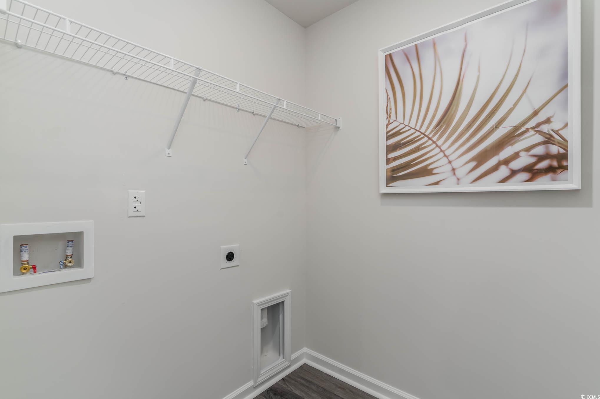 7431 Meadow Walk Loop Loris, SC 29569 - Photo 20 of 27 Laundry room with hookup for an electric dryer, baseboards, hookup for a washing machine, and dark wood-style flooring