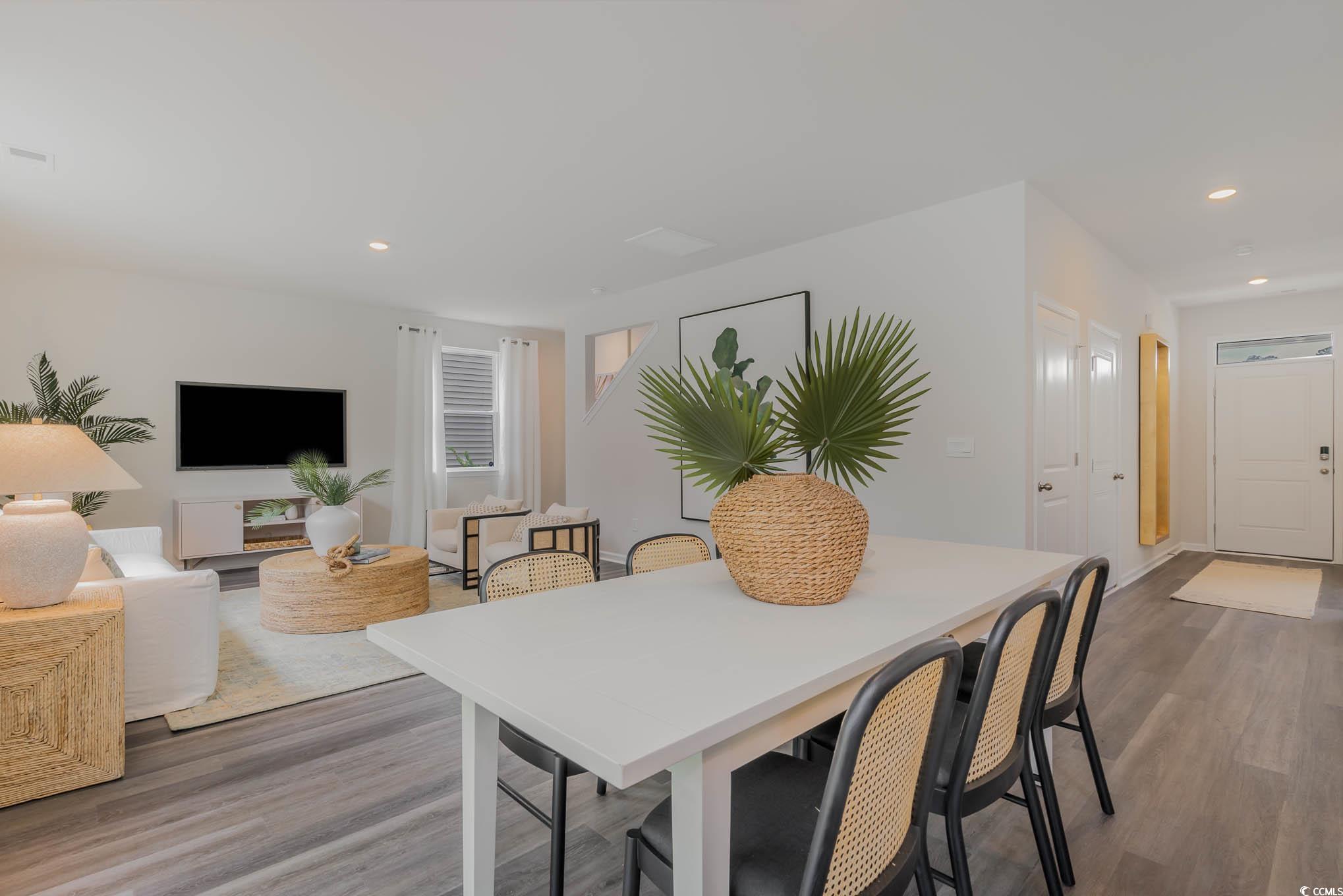 7431 Meadow Walk Loop Loris, SC 29569 - Photo 10 of 27 Dining space with wood finished floors and recessed lighting