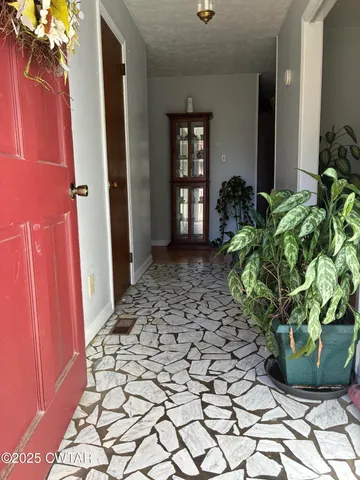 a view of a entryway door of the house