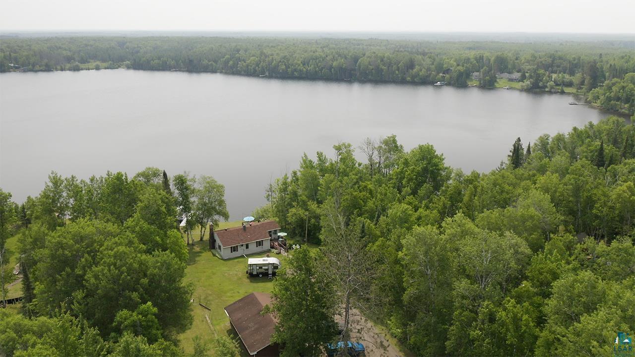 1198 West Mink Road Cotton, MN 55724 - Photo 21 of 23 Bird's eye view of a nearby body of water and a heavily wooded area
