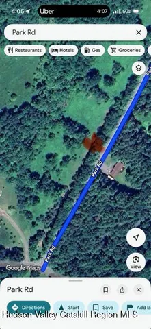 a picture of a garden with lots of buildings